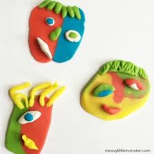 image of faces made with play dough 